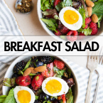 2 bowls filled with salad greens and berries topped with soft boiled eggs