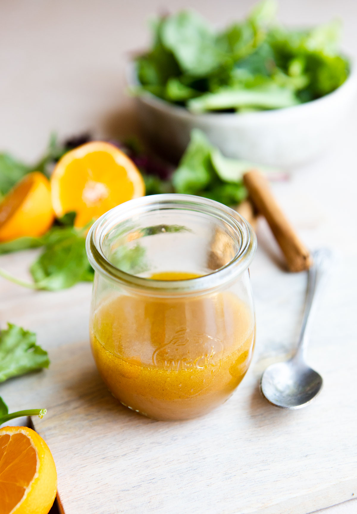 Maple orange vinaigrette in a small glass jar 