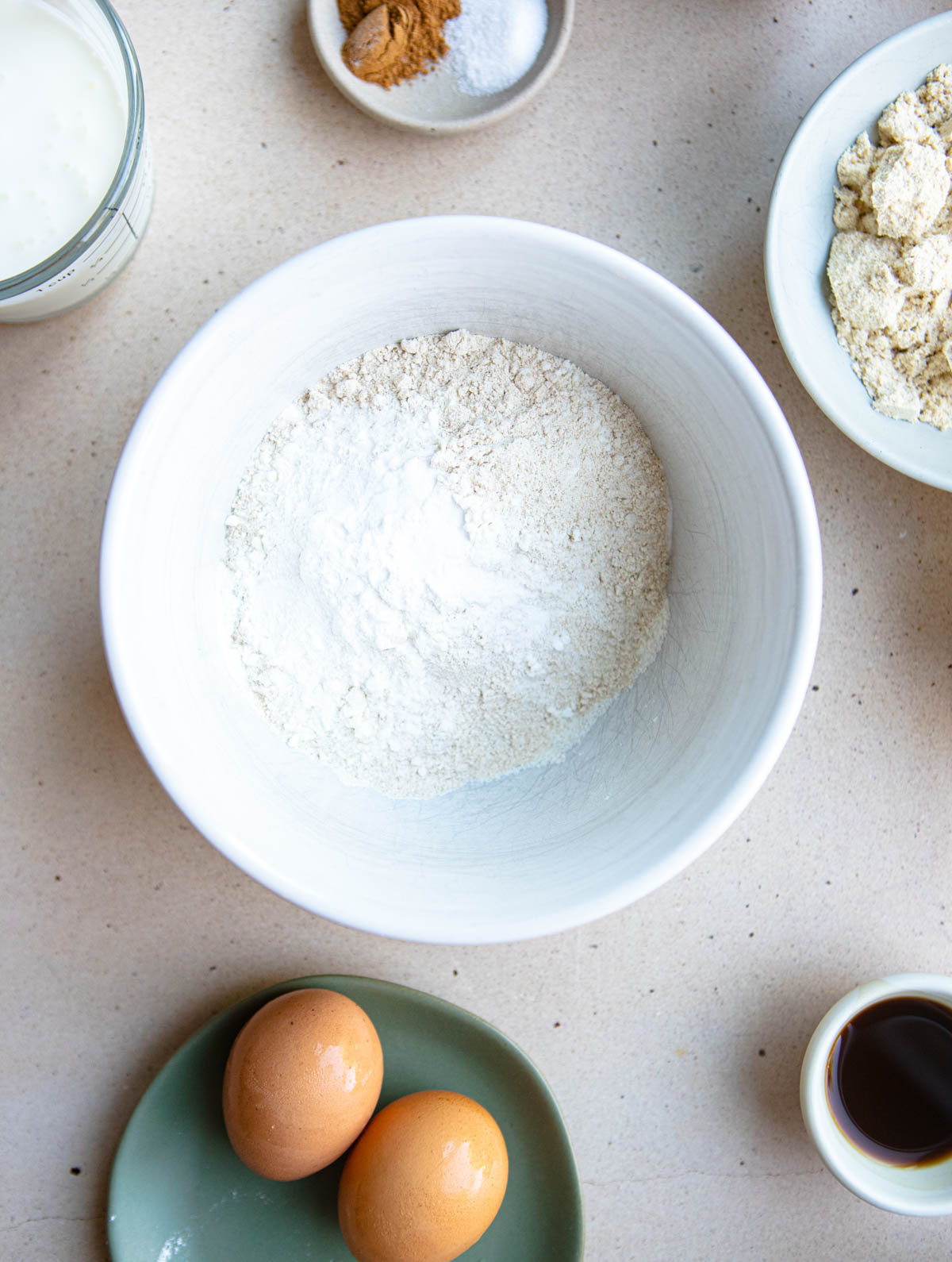 whole wheat flour and all purpose flour combined in a white mixing bowl