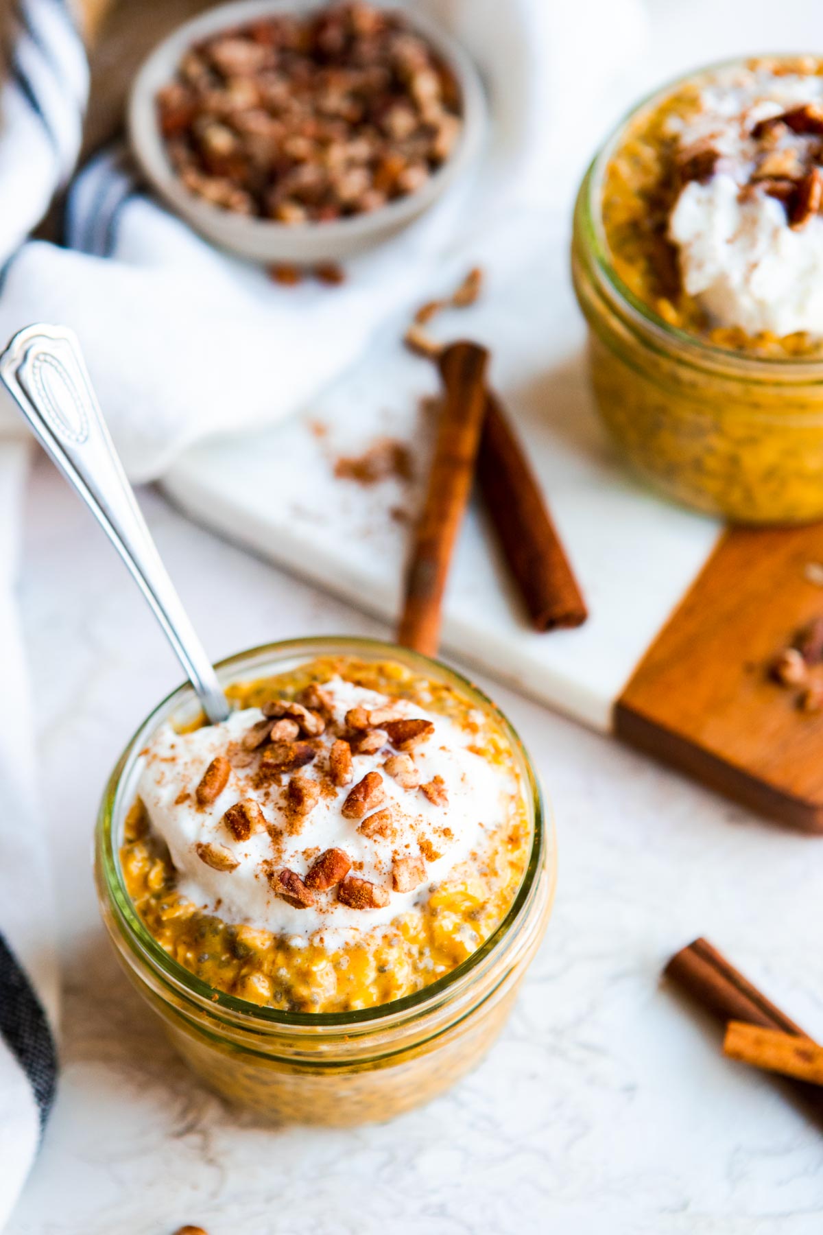 2 jars filled with pumpkin protein overnight oats