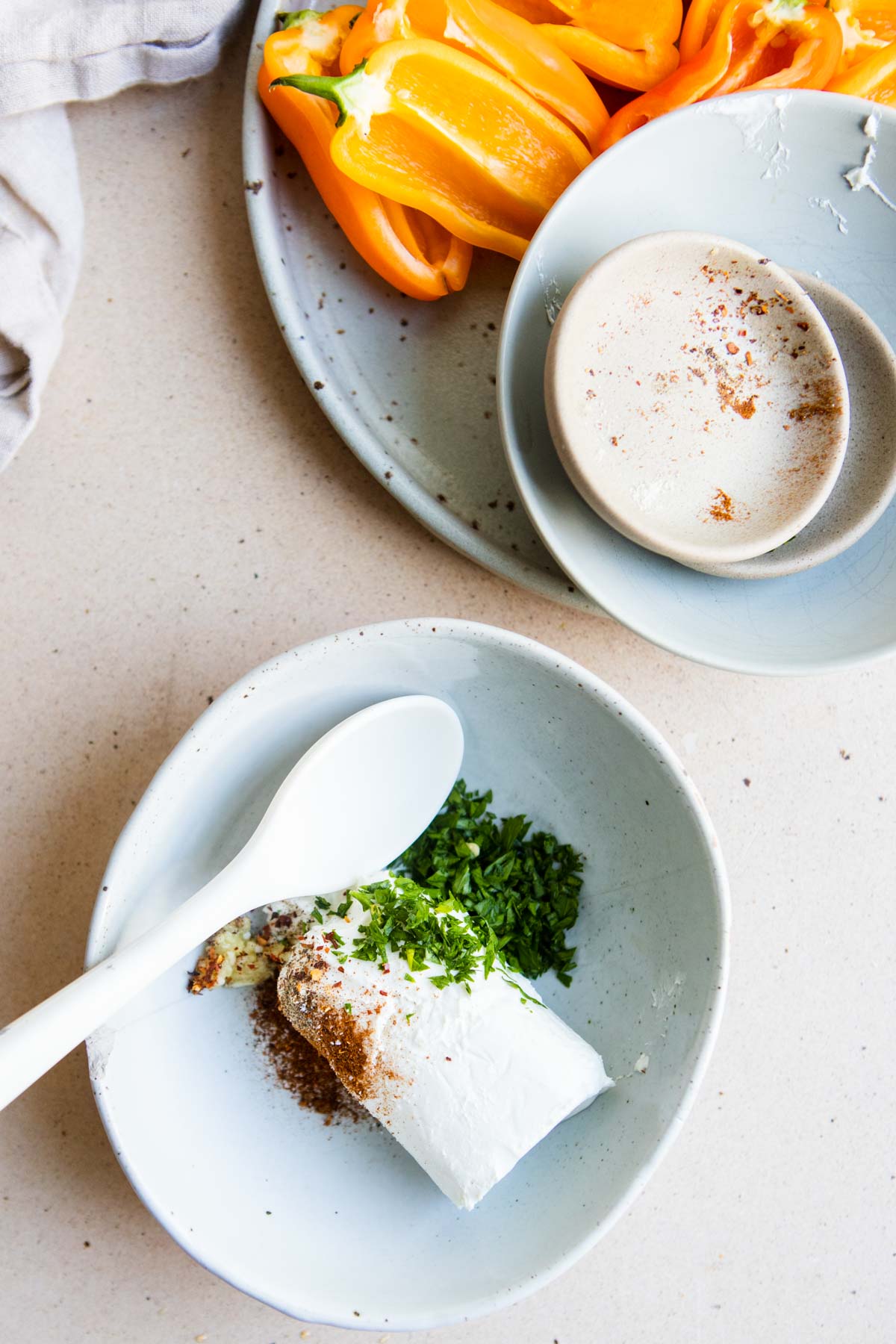 goat cheese and herbs in a small bowl