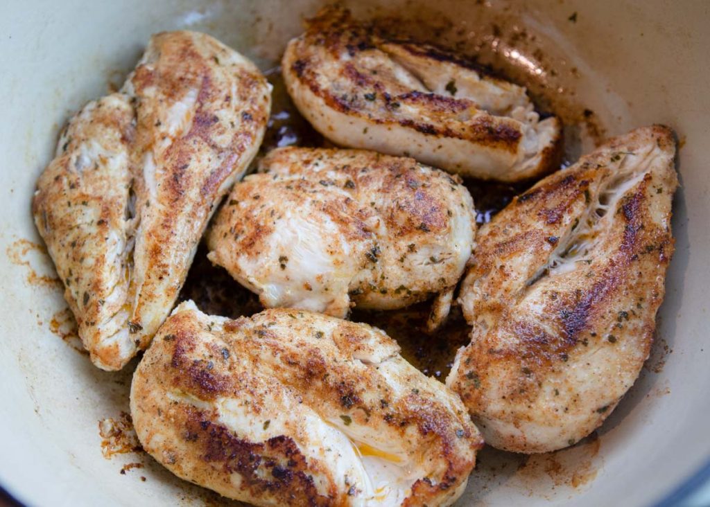 seasoning chicken breasts sauteed in a Dutch oven