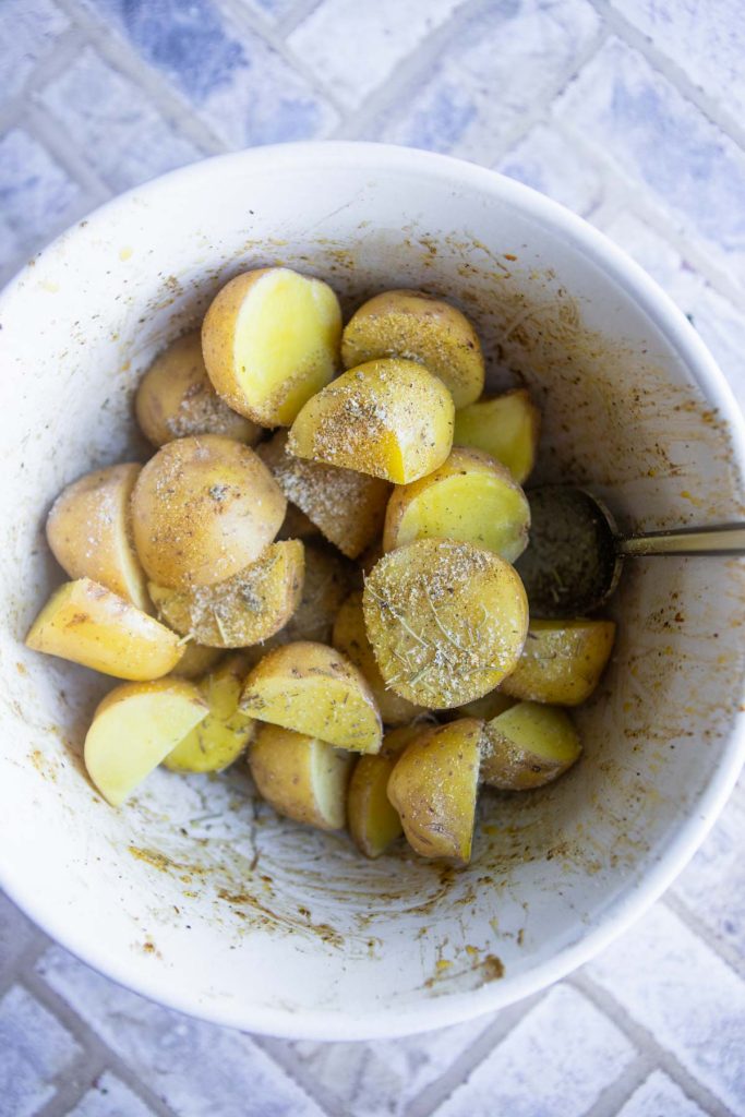 baby dutch yellow potatoes in a white ceramic bowl