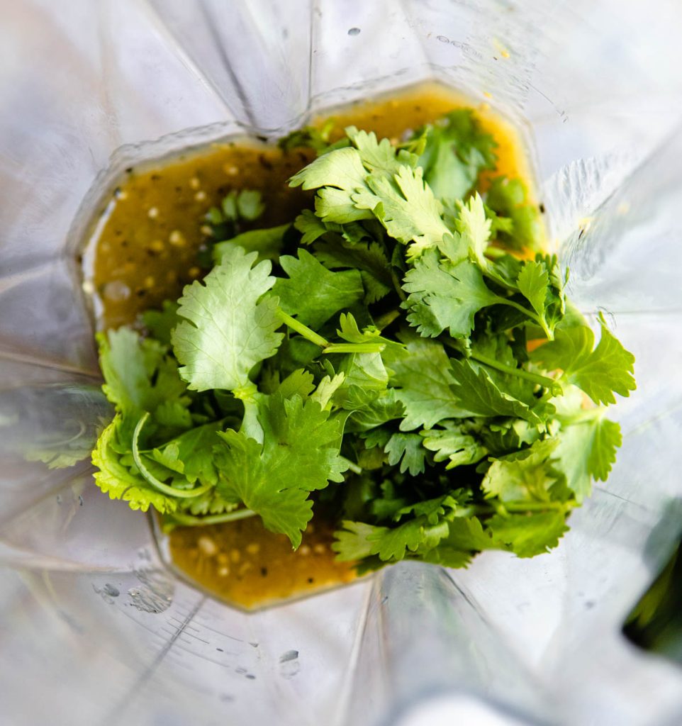 salsa verde and cilantro in a blender