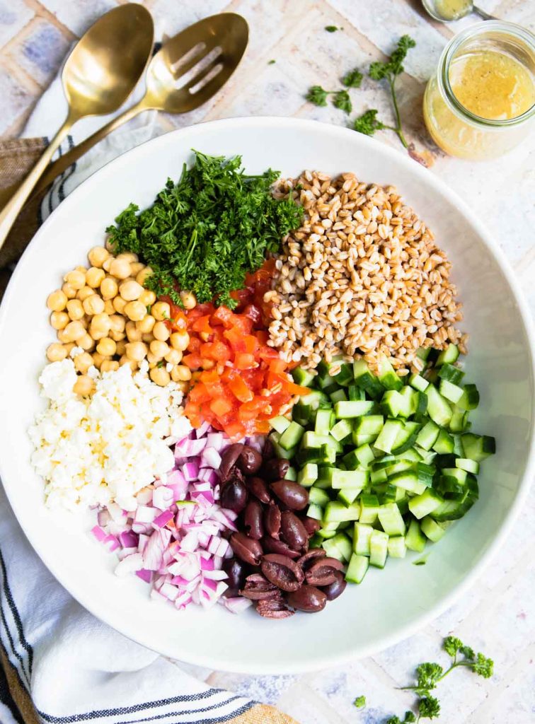 dressing and salad ingredients ready to be tossed together